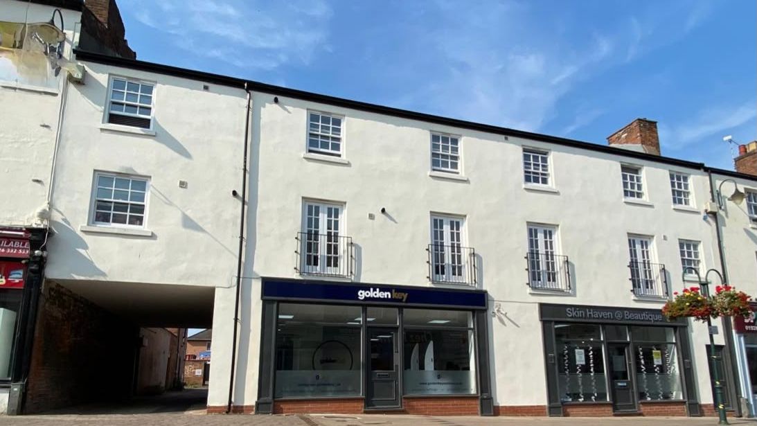 One empty shop, two trading units and eight apartments
